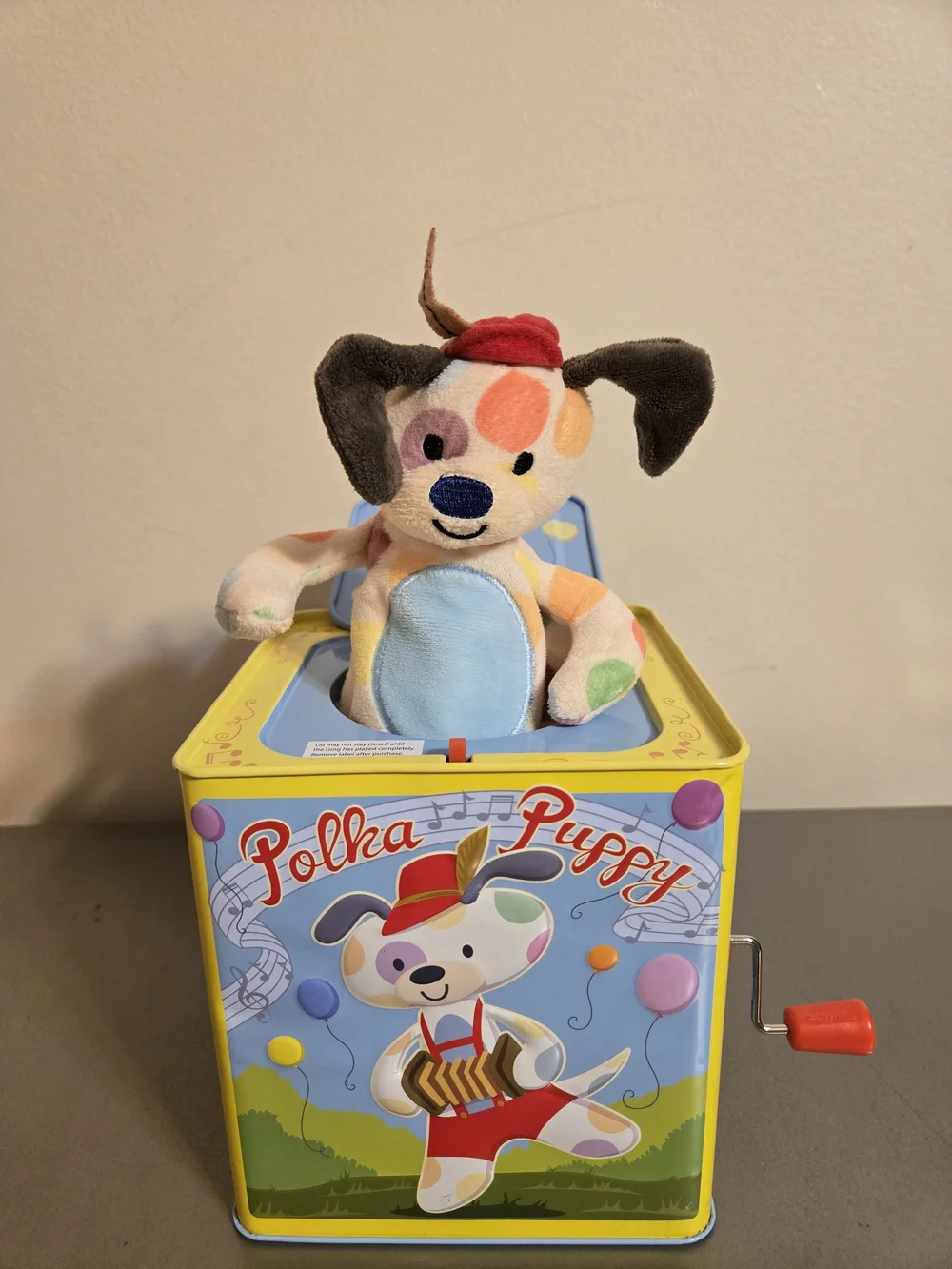 Schylling Polka Puppy Jack-in-the-Box Musical Toy